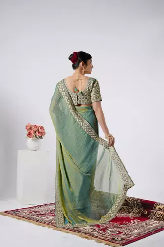 Celebrity type firozi heavy sequin border saree with unstitched blouse