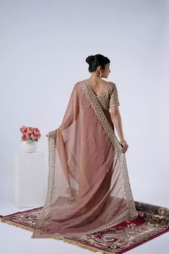Ethnic peach heavy sequin border saree with unstitched blouse