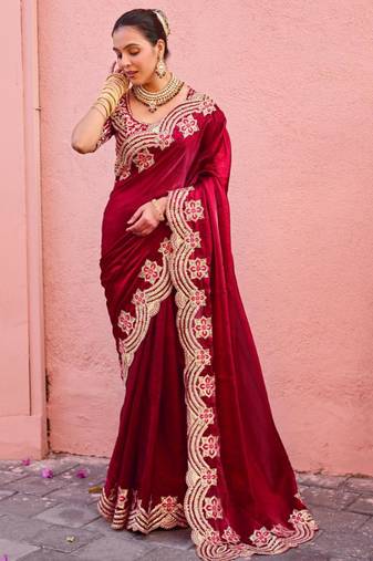 Celebrity inspired dark red embroidery border fandy satin saree with unstitched blouse