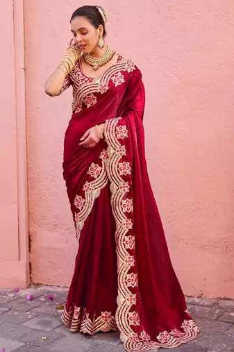 Celebrity inspired dark red embroidery border fandy satin saree with unstitched blouse