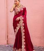 Celebrity inspired dark red embroidery border fandy satin saree with unstitched blouse