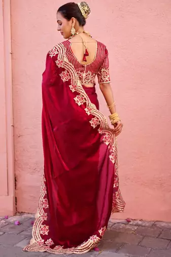 Celebrity inspired dark red embroidery border fandy satin saree with unstitched blouse
