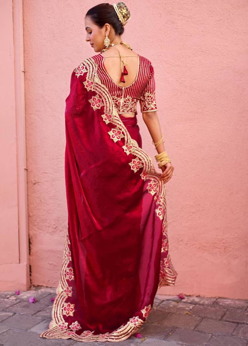 Celebrity inspired dark red embroidery border fandy satin saree with unstitched blouse