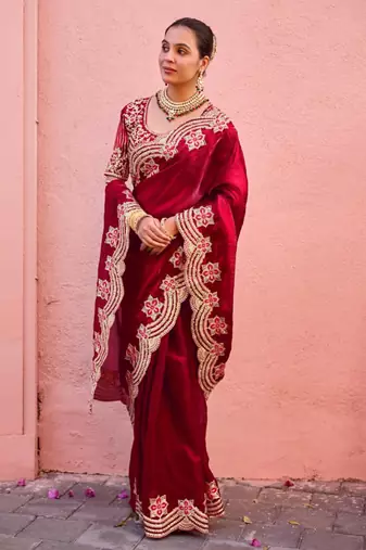 Celebrity inspired dark red embroidery border fandy satin saree with unstitched blouse