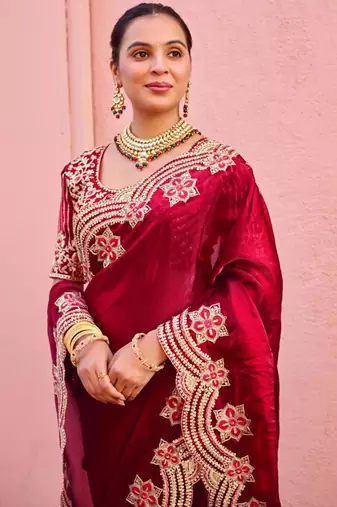 Celebrity inspired dark red embroidery border fandy satin saree with unstitched blouse