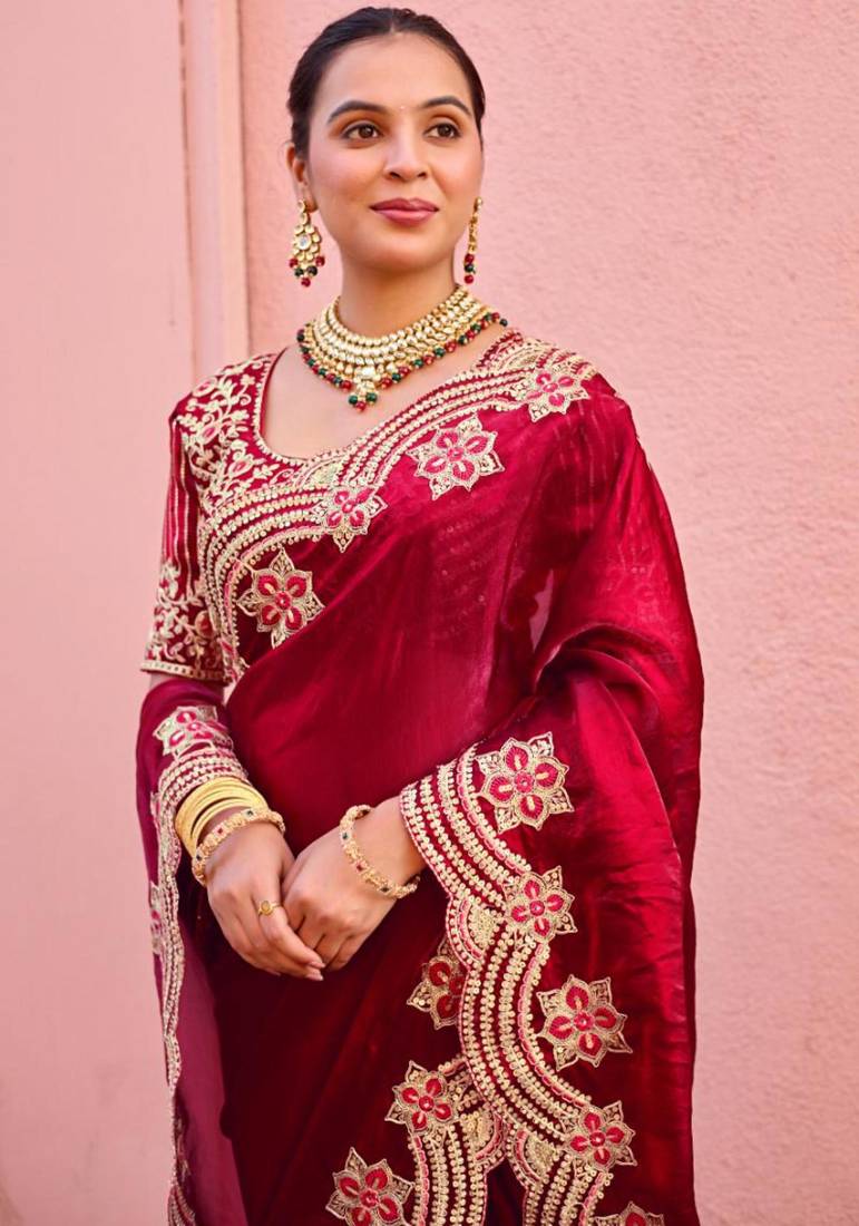 Celebrity inspired dark red embroidery border fandy satin saree with unstitched blouse