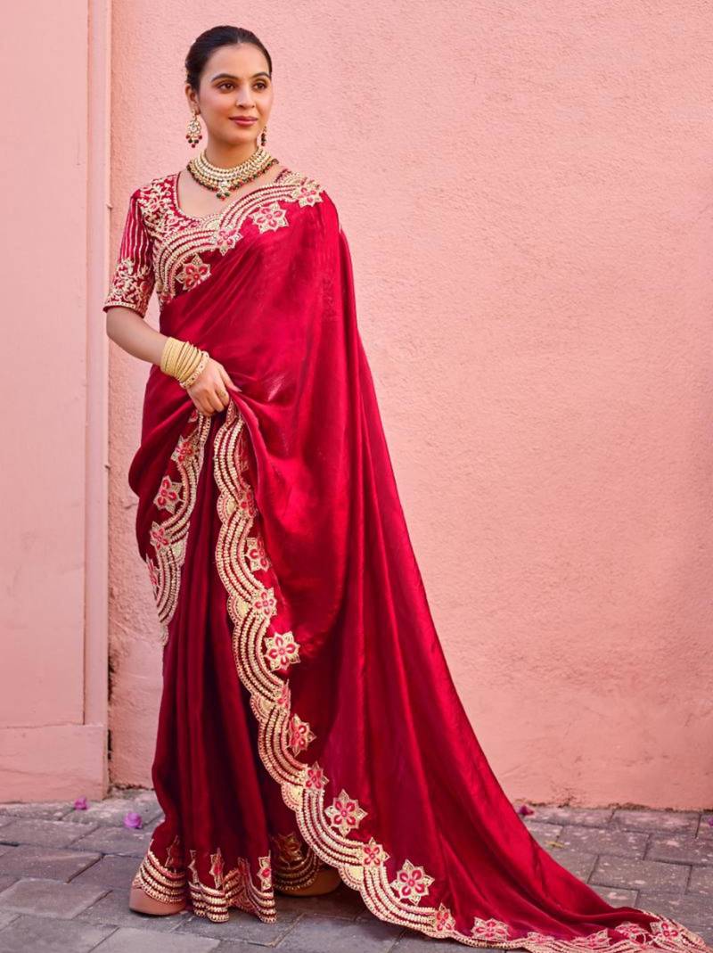 Celebrity inspired dark red embroidery border fandy satin saree with unstitched blouse