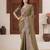 Celebrity inspired mustard olive embroidered elephant shimmer saree with unstitched blouse