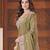 Celebrity inspired mustard olive embroidered elephant shimmer saree with unstitched blouse