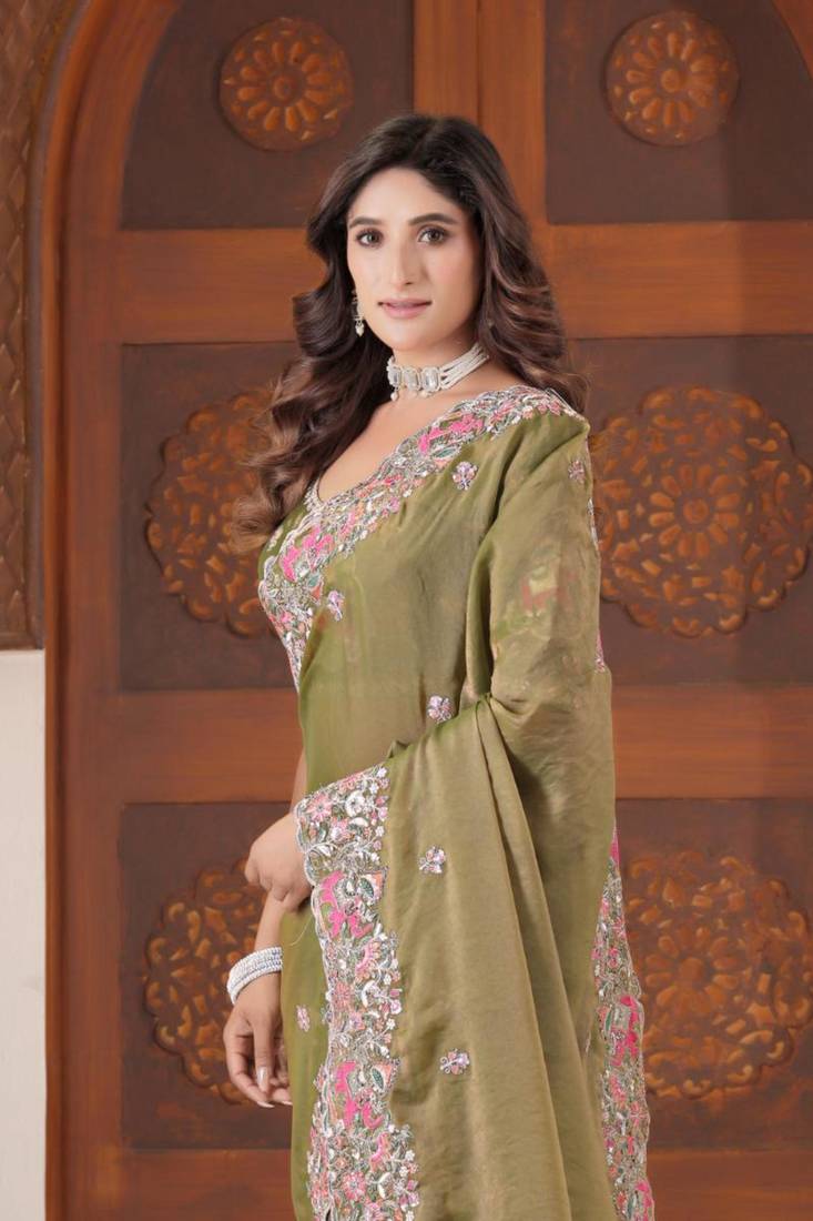 Celebrity inspired mustard olive embroidered elephant shimmer saree with unstitched blouse