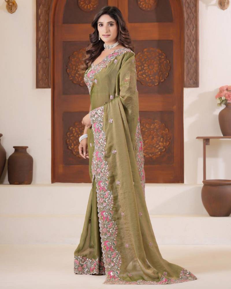Celebrity inspired mustard olive embroidered elephant shimmer saree with unstitched blouse
