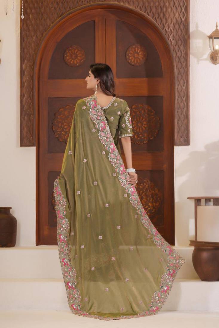 Celebrity inspired mustard olive embroidered elephant shimmer saree with unstitched blouse