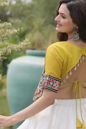 white silk blend embroidered traditional lehenga choli with free size upto 44
