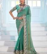 Pure sea green embroidered floral border moss shimmer saree with unstitched blouse