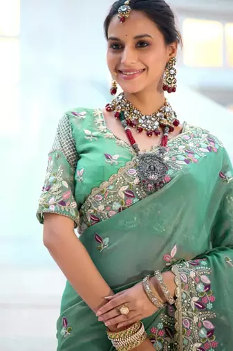 Pure sea green embroidered floral border moss shimmer saree with unstitched blouse