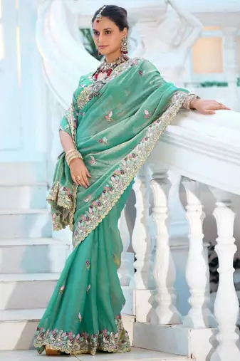 Pure sea green embroidered floral border moss shimmer saree with unstitched blouse