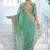 Pure sea green embroidered floral border moss shimmer saree with unstitched blouse