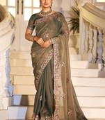 Celebrity type olive gray embroidered border motifs moss shimmer saree with unstitched blouse