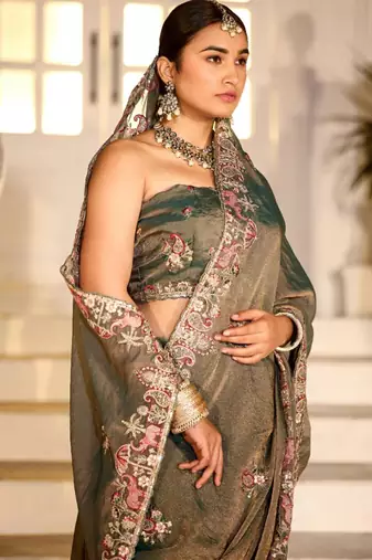 Celebrity type olive gray embroidered border motifs moss shimmer saree with unstitched blouse