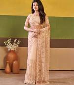 Ethnic champagne beige embroidered borders net saree with unstitched blouse