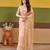 Ethnic champagne beige embroidered borders net saree with unstitched blouse