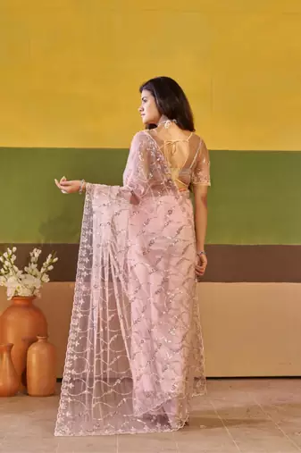Traditional mauve pink embroidered borders net saree with unstitched blouse