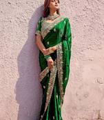Pure green embroidered border motifs fandy satin saree with unstitched blouse