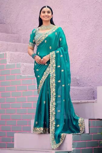 soft silk blend teal blue embroidered border motifs fandy satin saree with unstitched blouse