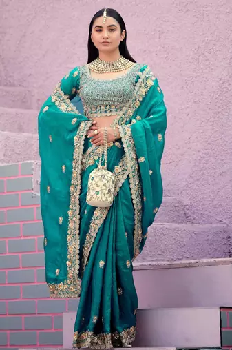 soft silk blend teal blue embroidered border motifs fandy satin saree with unstitched blouse