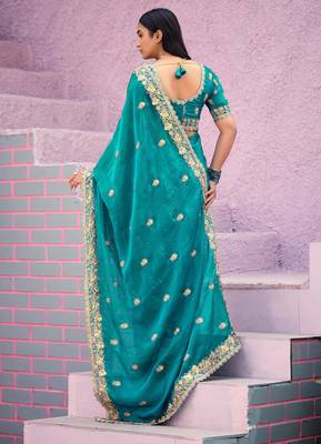 soft silk blend teal blue embroidered border motifs fandy satin saree with unstitched blouse 5