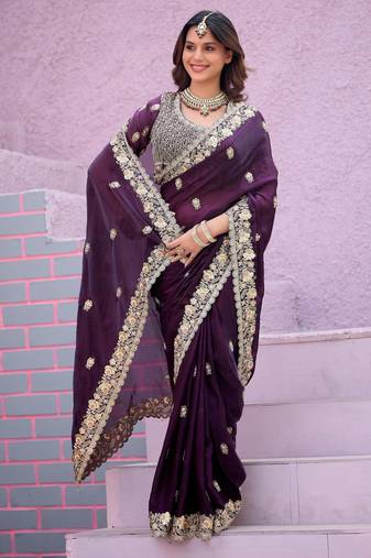 Celebrity type wine purple embroidered border motifs fandy satin saree with unstitched blouse