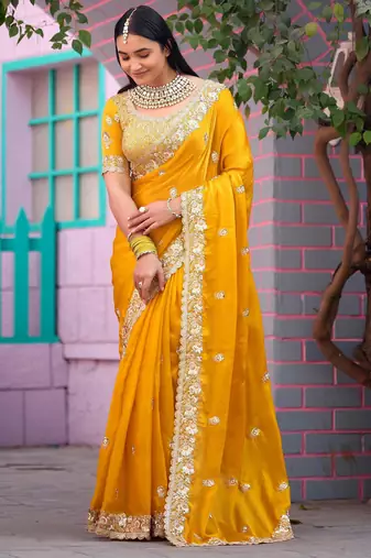 Floral yellow embroidered border motifs fandy satin saree with unstitched blouse