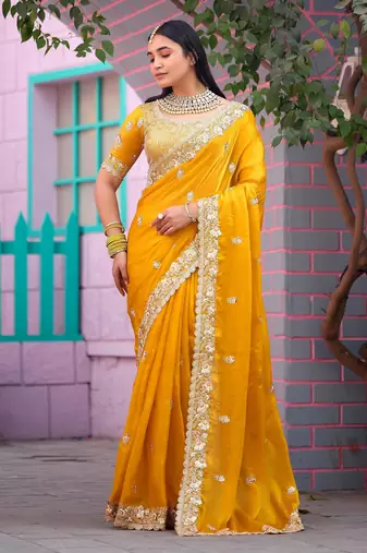 Floral yellow embroidered border motifs fandy satin saree with unstitched blouse