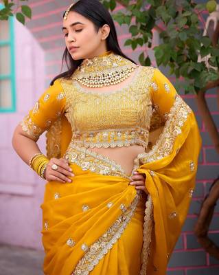 Floral yellow embroidered border motifs fandy satin saree with unstitched blouse 4