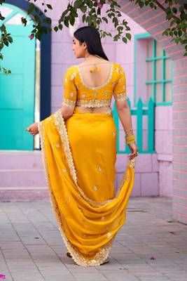 Floral yellow embroidered border motifs fandy satin saree with unstitched blouse 5