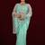 Embellished aqua sea green sequin embroidery embroidered border net saree with unstitched blouse