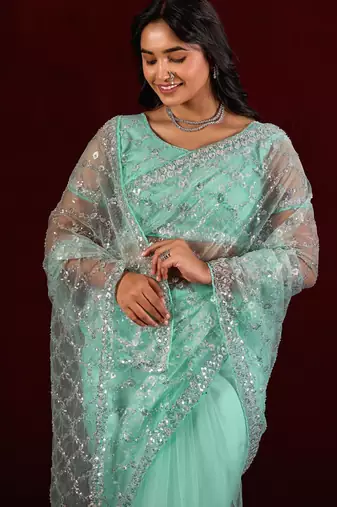 Embellished aqua sea green sequin embroidery embroidered border net saree with unstitched blouse