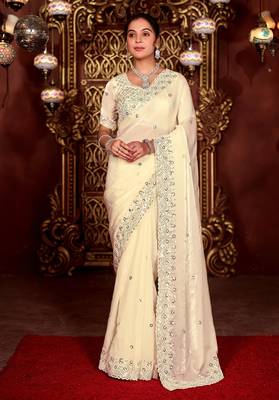 Celebrity inspired cream diamond sequin jaal embroidered border mono nylon fabric saree with unstitched blouse 1