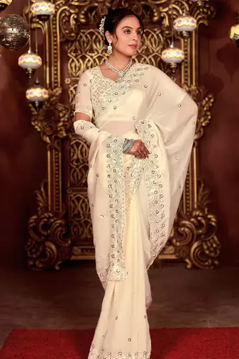 Celebrity inspired cream diamond sequin jaal embroidered border mono nylon fabric saree with unstitched blouse