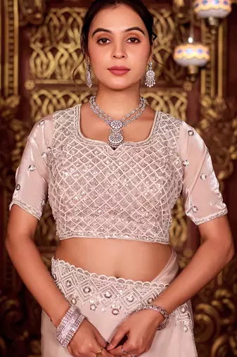 Designer peach diamond sequin jaal embroidered border mono nylon fabric saree with unstitched blouse