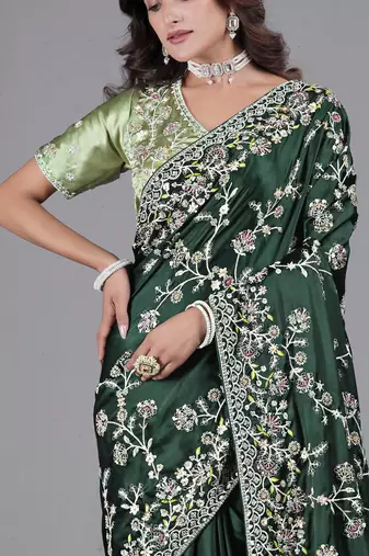 Light weight green embroidered in multi-colored satin saree with unstitched blouse