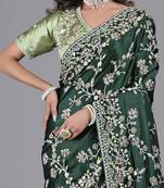 Light weight green embroidered in multi-colored satin saree with unstitched blouse