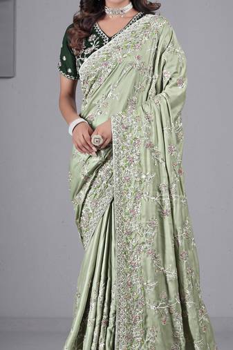 Fashionable pista embroidered in multi-colored satin saree with unstitched blouse