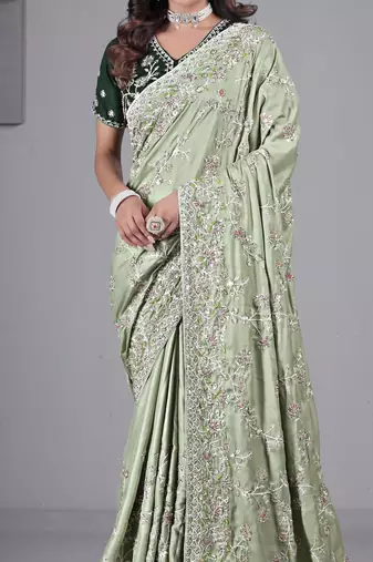 Fashionable pista embroidered in multi-colored satin saree with unstitched blouse