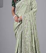 Fashionable pista embroidered in multi-colored satin saree with unstitched blouse