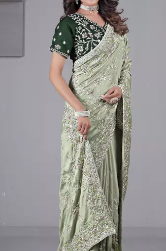 Fashionable pista embroidered in multi-colored satin saree with unstitched blouse
