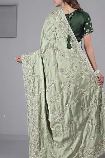 Fashionable pista embroidered in multi-colored satin saree with unstitched blouse