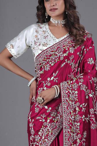 soft silk blend rani embroidered in multi-colored satin saree with unstitched blouse
