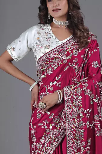 soft silk blend rani embroidered in multi-colored satin saree with unstitched blouse