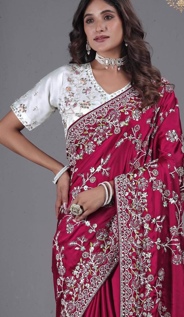soft silk blend rani embroidered in multi-colored satin saree with unstitched blouse